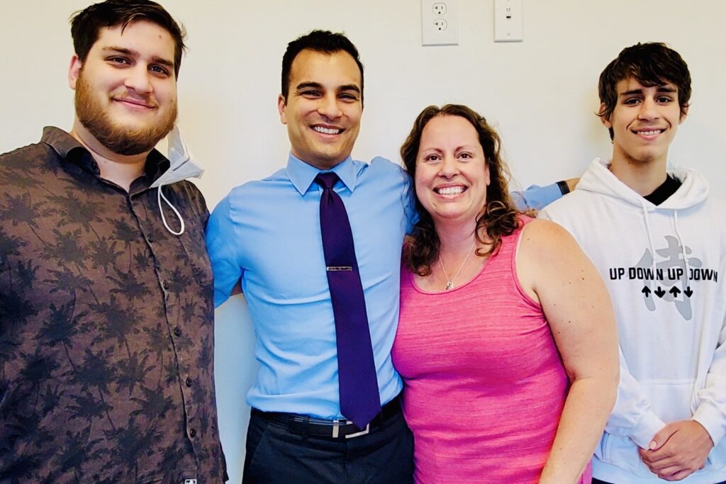 Dr. David Sedghi, working with family patient